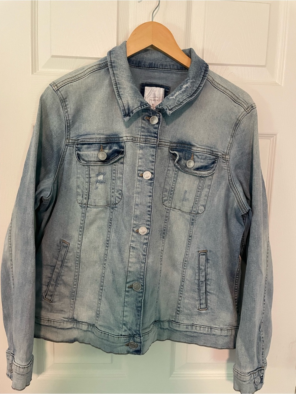 Lauren Conrad Woman’s Light Wash Denim Jacket. Only worn a handful of times.